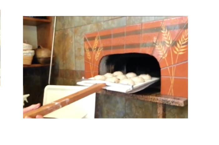 image of a long handled super peel used to load bread into an oven